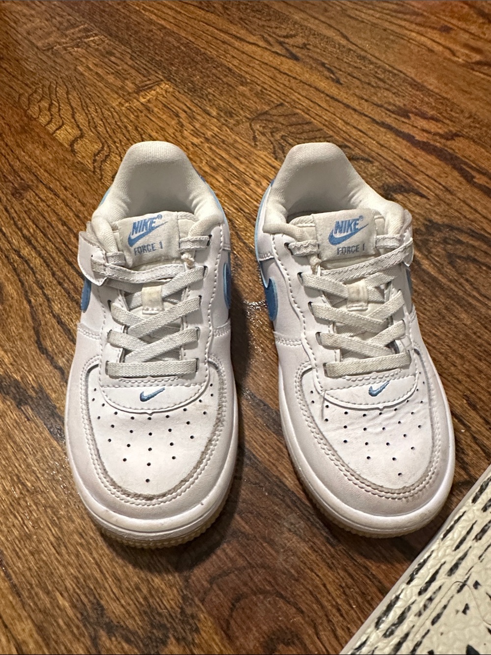 Nike Kids White Sneakers with Light Blue Accents